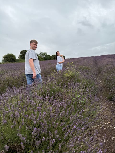 Tallulah and Thomas in a lavender field, one turning back to the camera