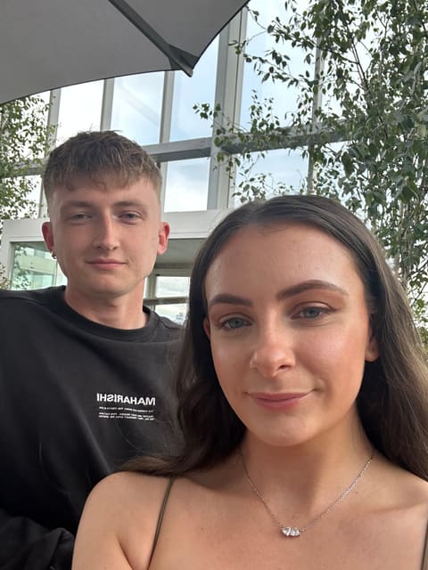 A selfie of Tallulah and Thomas in a sunny room