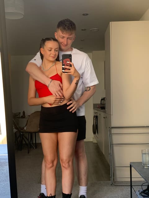 A mirror selfie of Tallulah and Thomas at home